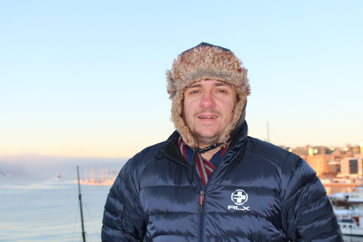 Visiting Oslo in January - man with furry hat and big jacket on
